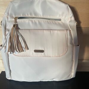 Elegant Cream Backpack with Tassel
